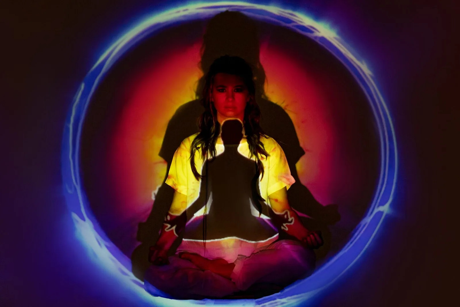 Hands resting on knees in a meditation posture